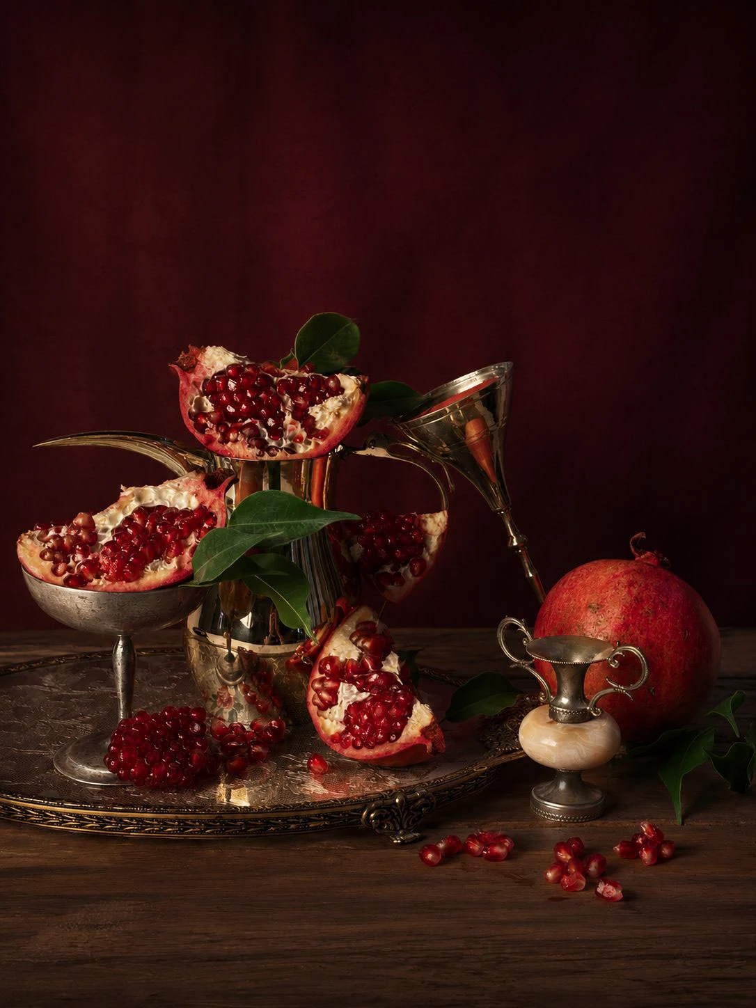 Crimson Harvest, pomegranates and antique vessels