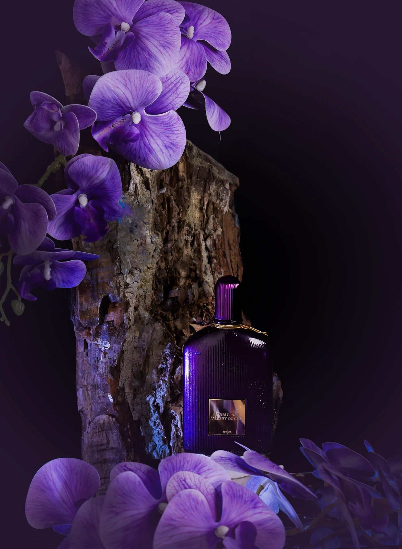 Tom Ford Velvet Orchid with purple orchids and wood